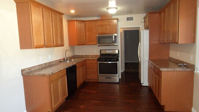 Building Photo - Single Story 4BR 2BA Home 2 Car Garage