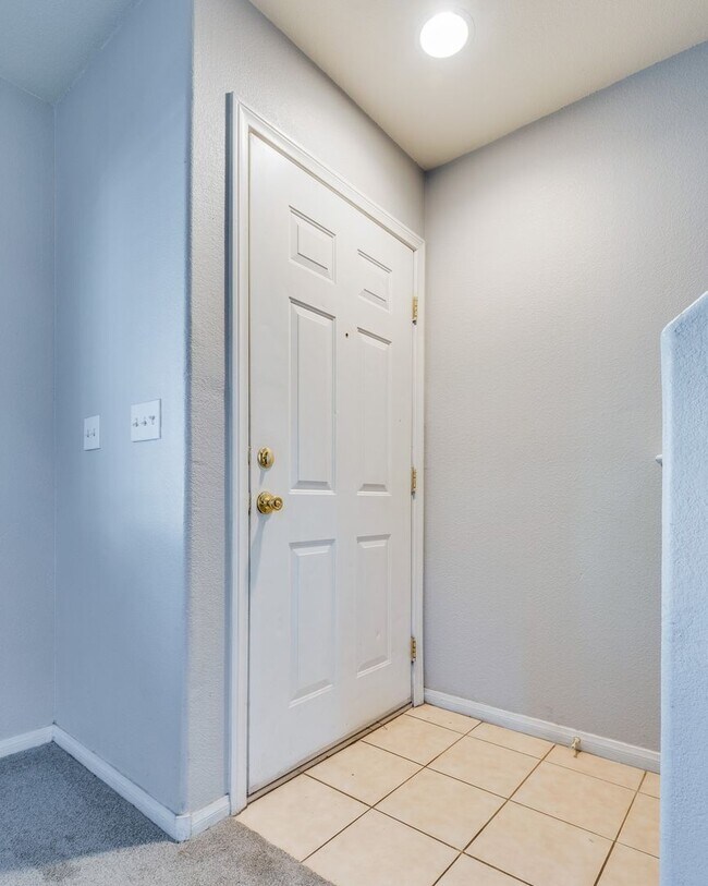 Building Photo - Very nice kept two-story 3 bedroom 2 bath house in a small gated community on the east side