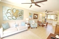 Building Photo - Beach Style 2 bed/2bath Luxury Condo - Finely Furnished - Steps from the Beach - Resort Amenities -