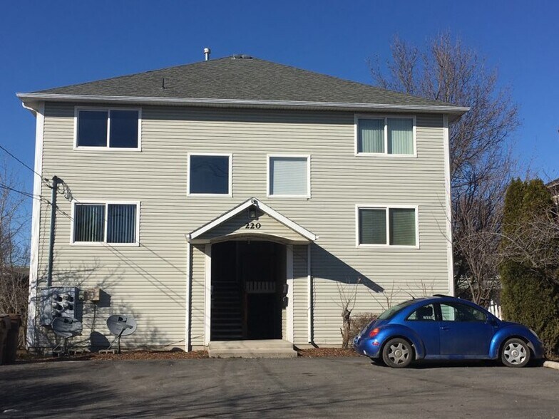 Front of coplex, paved parking lot - 220 E Mission Ave