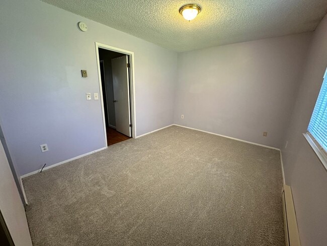 Building Photo - 3-Bedroom Unit on one level with a 1-car garage! Rent includes water-sewer and garbage!