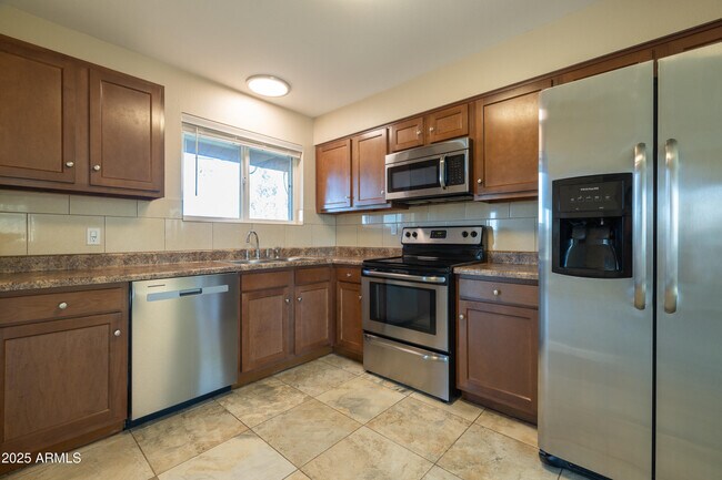 Building Photo - 10530 W Alabama Ave