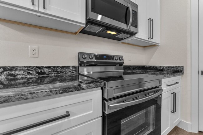 Building Photo - All Units Are Available With Brand NEW Full Appliance Package