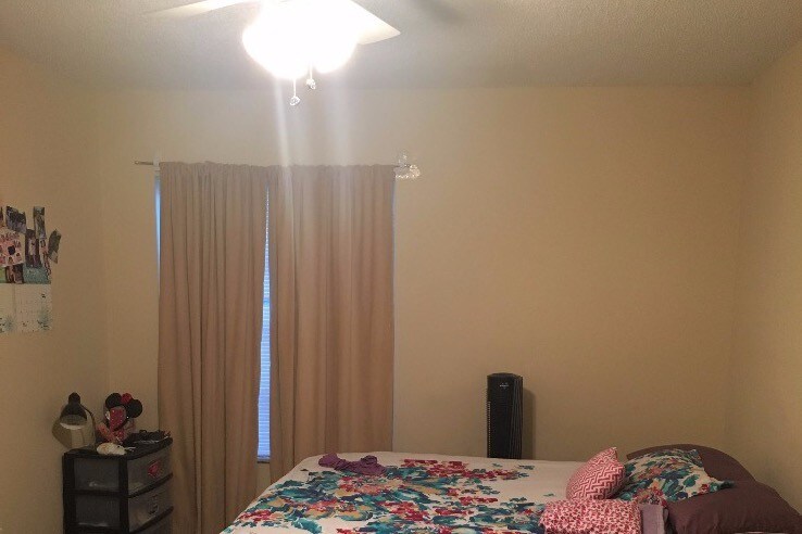 furnished bedroom - 450 NW 20th St