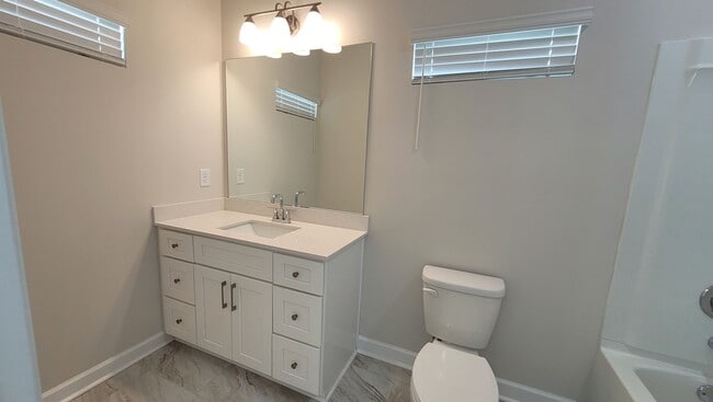 Building Photo - NEW BUILD DELUXE CONDO IN WEST MIDTOWN ATLANTA