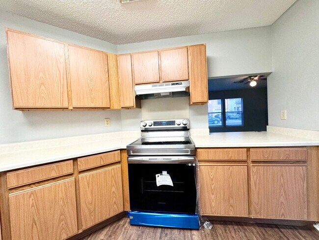 Building Photo - Welcome Home New Fridge, New Stove!