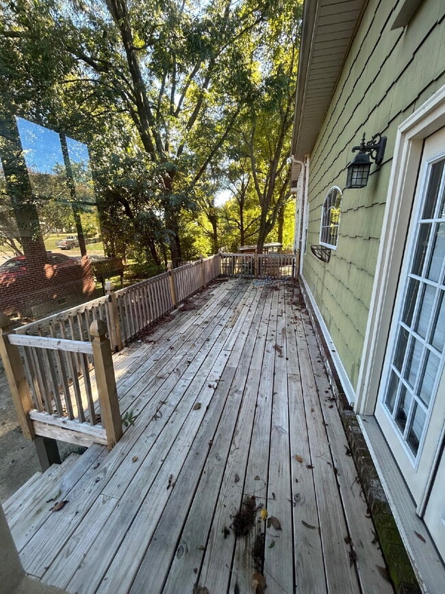 Building Photo - "Charming 4-Bedroom Retreat with Granite F...