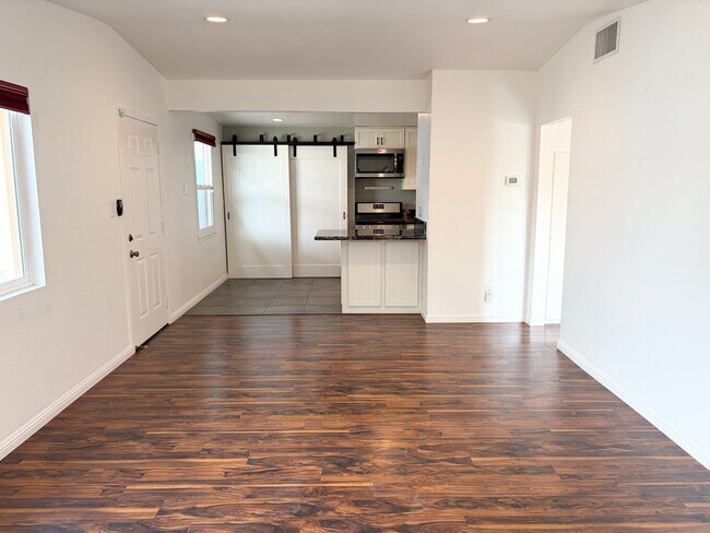 Building Photo - Beautifully Maintained 4-Bedroom Home with Private Backyard