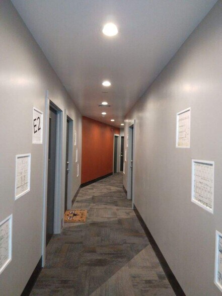 E Wing apartment hallway, shared among 5 apartments - 208 W Broadway St