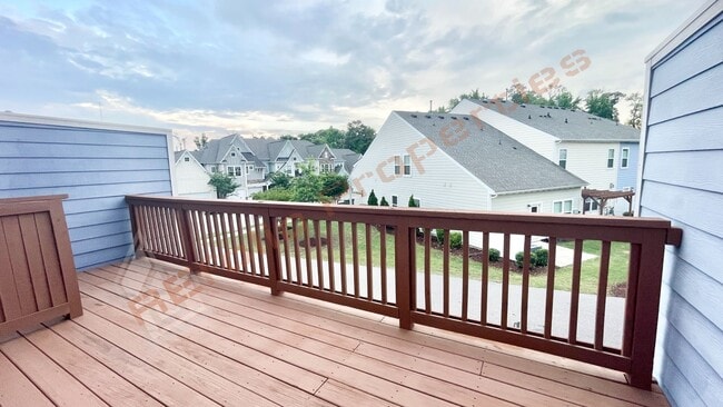 Building Photo - 3 Story Townhome 3 Bedrooms Rear Entry 2 Car Attached Garage with 1st Floor Bedroom, Community Po...