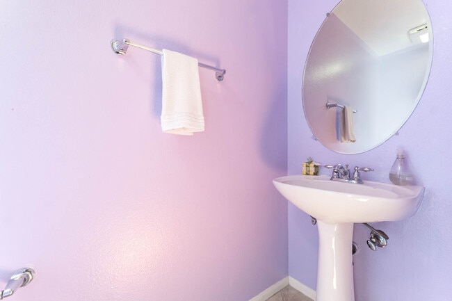 Discreetly tucked powder room - 5220 Premiere Hls Dr