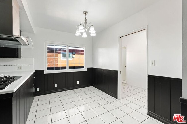 Building Photo - 11004 Mansel Ave