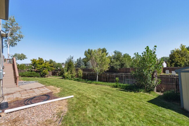 Building Photo - 7950 S Garrison Ct