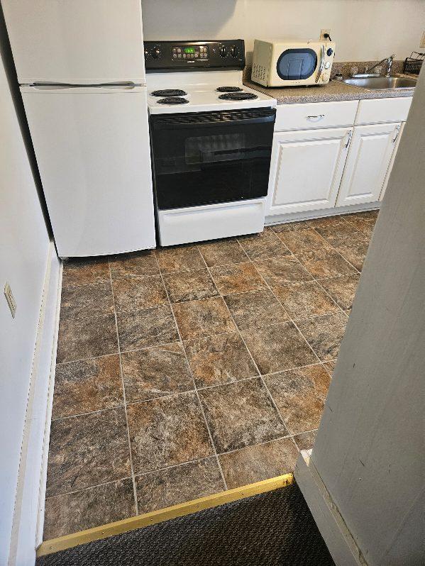 Refrigerator, Range, Microwave included - 338B - 338 E 8th St