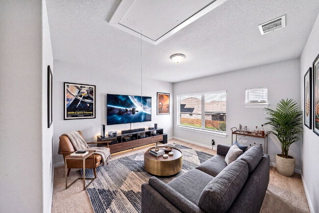 Building Photo - Greenbelt. 3 Car Garage. Built In Dog Room.