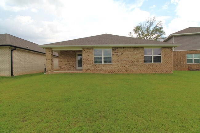 Building Photo - Coming Available Soon – 4BR/2BA Brick Home with Open Floor Plan, Solar Panels & 2-Car Garage in L...
