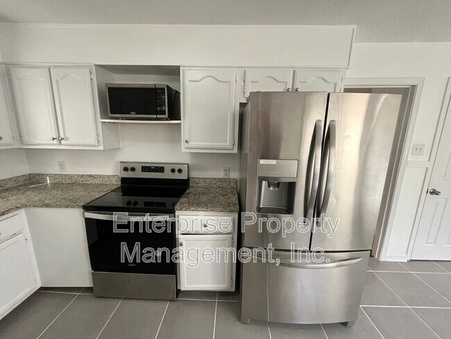 Building Photo - 6243 Brightwood Cove