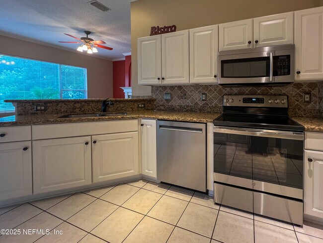 Building Photo - 1704 Tall Tree Dr E