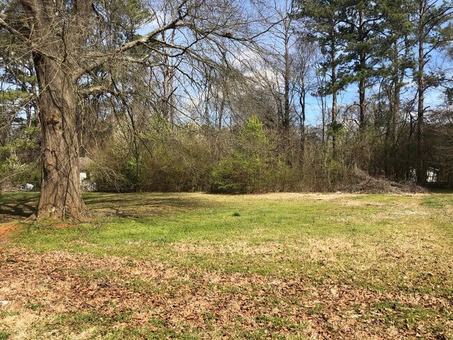 Building Photo - Renovated Farmhouse Inspired Brick Ranch