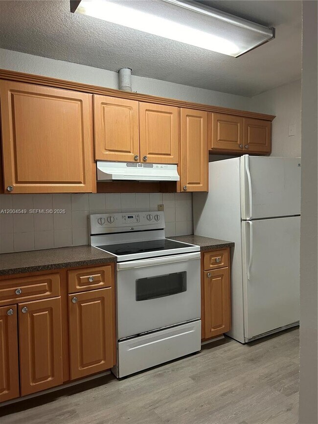 Building Photo - 12960 SW 66th Ln