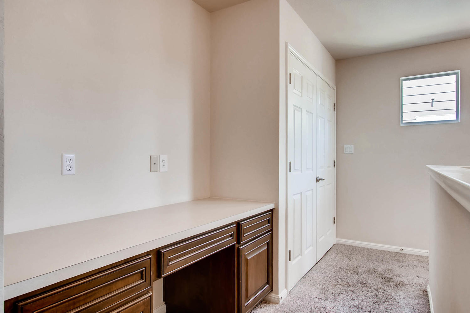 Functional desk/storage space in upstairs hallway. - 1813 Carlson Drive