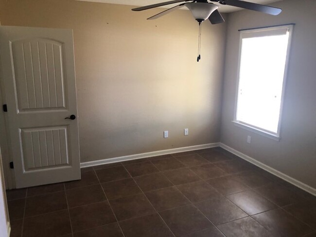 Bedroom with ceiling fans - 107 S Grant St