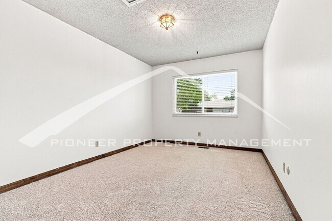 Building Photo - Spacious Home with Central AC and Traditional Wood Features
