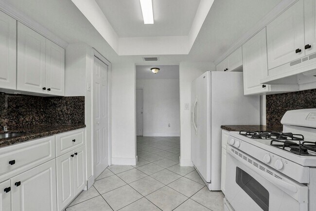 Building Photo - Sunrise Gem: Updated 2-Bed, 2-Bath with Garage Parking