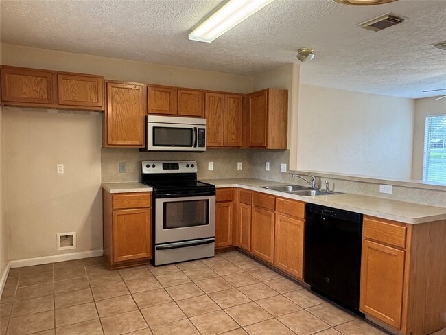 Building Photo - 14129 Broken Arrow Dr