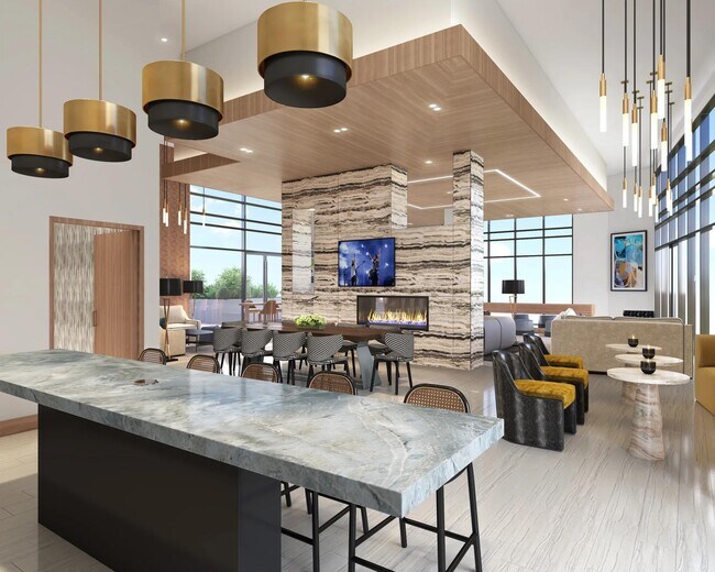 29th-floor sky lounge at Modera McGavock apartments with gathering space, demonstration kitchen, and comfortable seating. - Modera McGavock