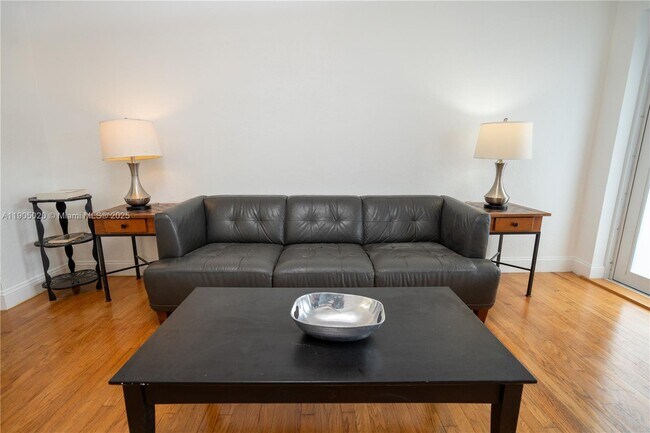 Building Photo - 7445 Harding Ave