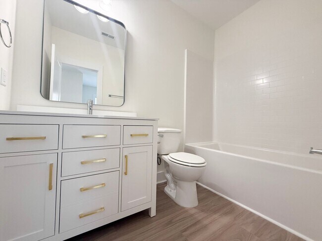 Building Photo - Spacious 4-Bedroom Townhome at Highbury + Summer Special