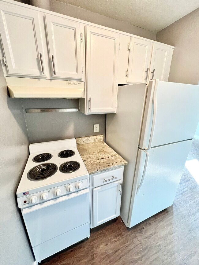 Step into this efficient kitchen space, ideal for modern living. - Williams Street