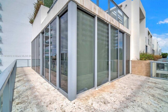 Building Photo - 9501 Collins Ave