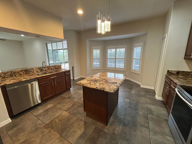 Building Photo - Corner Lot, 4 Bedroom Home with Pool at No...