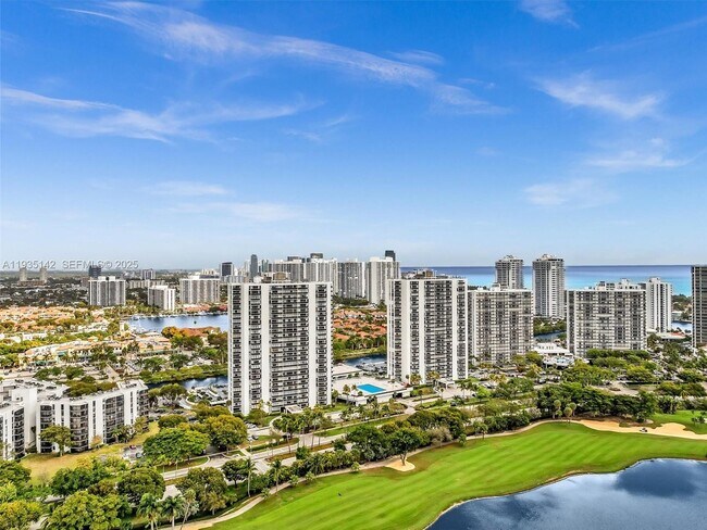 Building Photo - 3675 N Country Club Dr