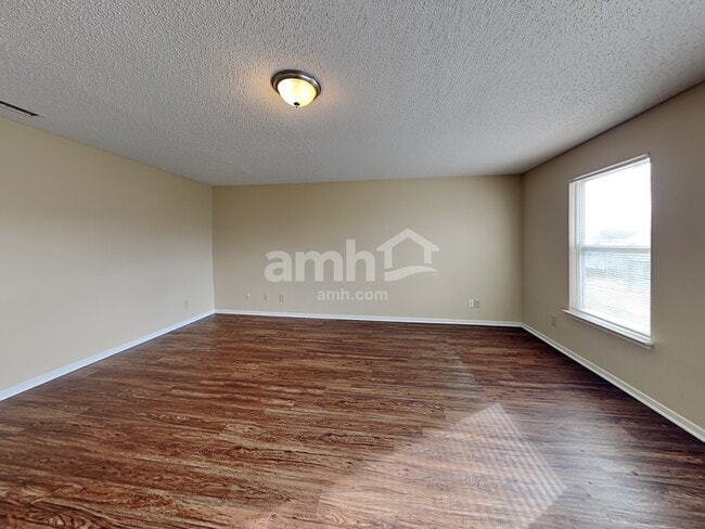 Building Photo - 6850 W Littleton Dr
