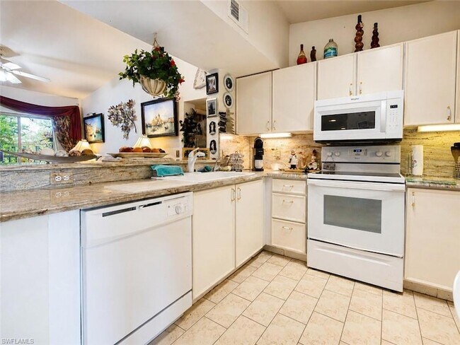 Building Photo - 8294 Key Royal Cir