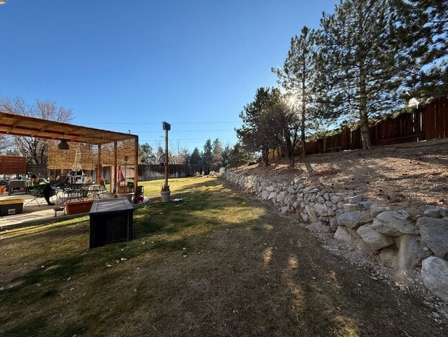 Building Photo - Spacious 5-Bedroom Cul-de-Sac Home with Downstairs Living and Incredible Backyard