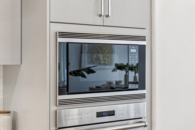 Building Photo - Luxury Single-Level Corner Residence with Wolf Kitchen & Private Garage
