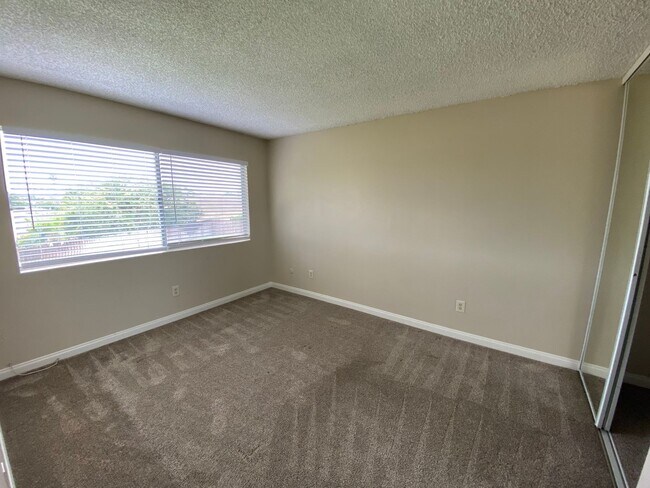 Building Photo - LOCATION & PRIVACY! Spacious 3 br Condo wi...
