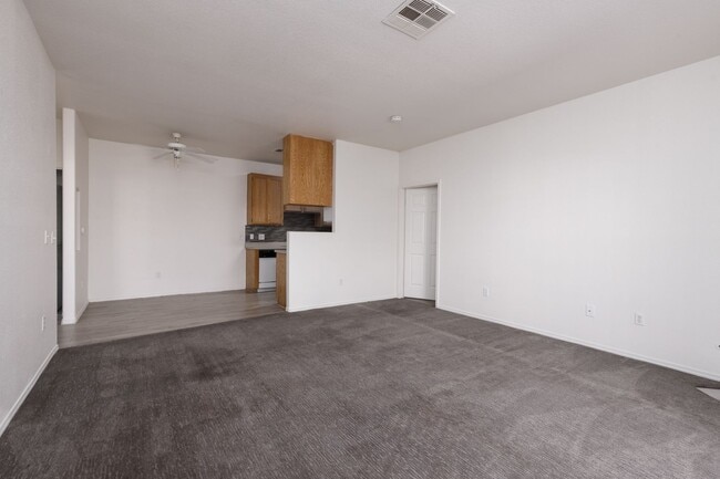 Building Photo - Two bedroom unit in gated NE community with pool