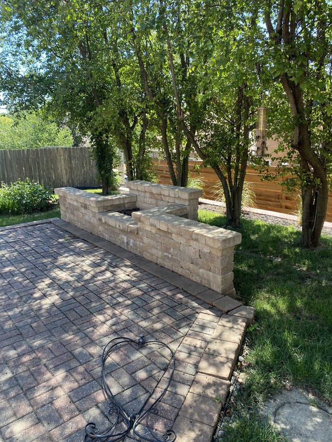 Back patio with gas fireplace - 4507 Walnut St