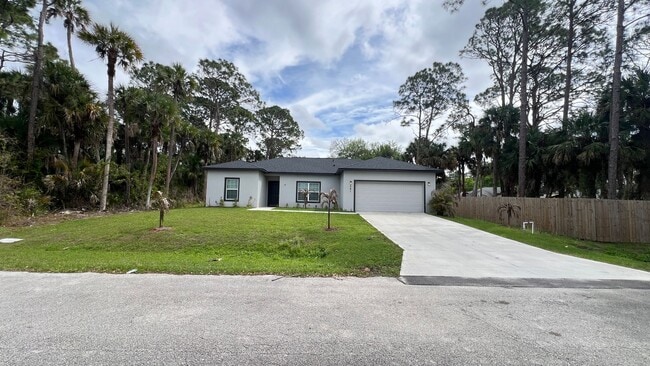 Building Photo - AWESOME 3 Bedroom, 2 Bathroom Home in Beautiful Palm Bay!!