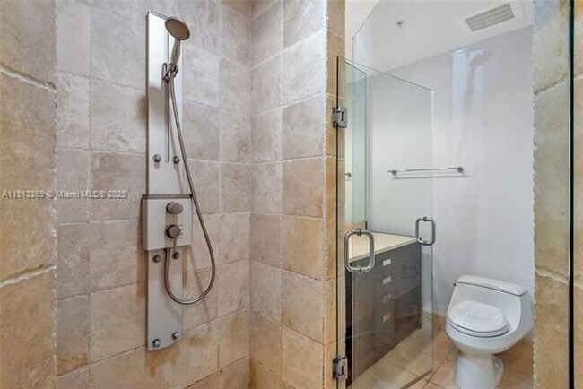 Building Photo - 18201 Collins Ave