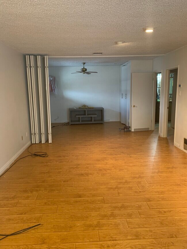 Main living room and 2nd bedroom available when collapsed door closed - 1914 W Alameda Ave