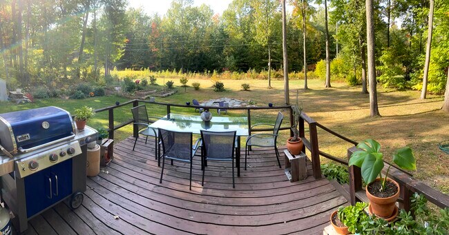 Large backyard abuts miles of walking trails - 415 Sunderland Woods Rd