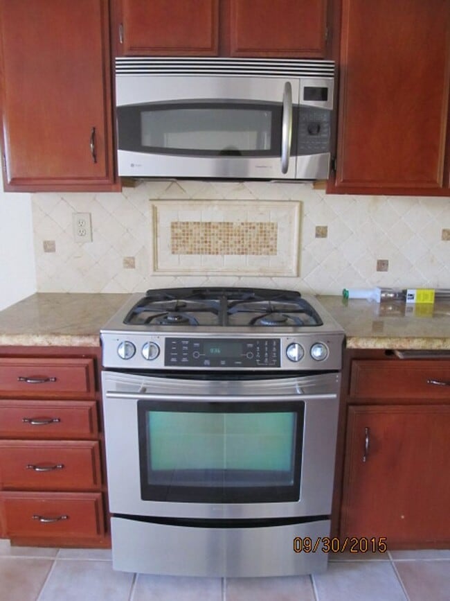 Building Photo - LOVELY 2 BR/1.5 BATH, 2 STORY CONDO WITH GARAGE