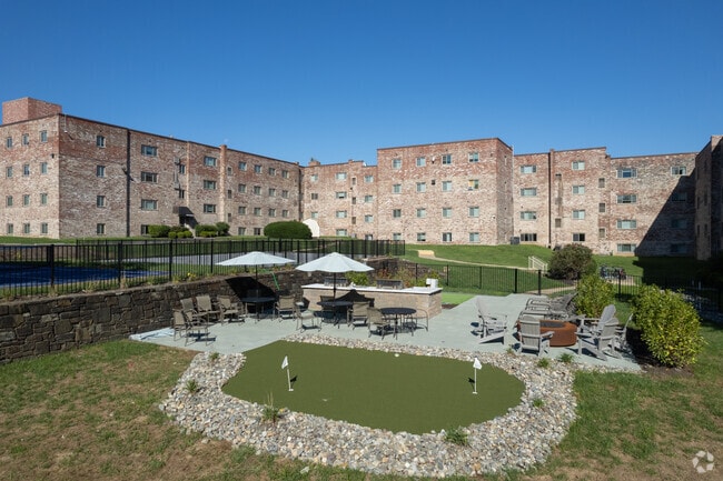 Outside Lounge - Ridge Carlton Apartments