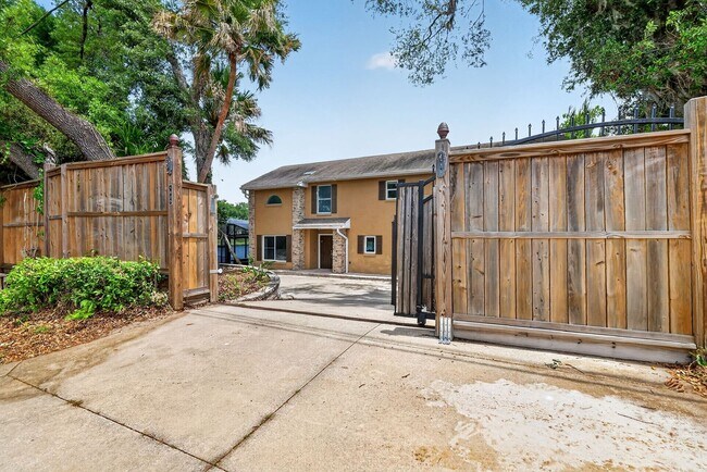 Building Photo - Available Now! Waterfront Living at Its Best – Pool, Decks & Gated Privacy